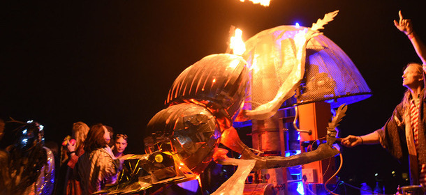 Project director and Dung Beetle Co-creator Jeffrey Barbee fires off a fiery blast from the Beetle's Bum.  This Alliance Earth outreach project debuted at Afrika Burn 2018, and is in development to create a fully usable gassification system for rural and urban areas to deal with plastic pollution in June, 2018. Visit us at www.dungbeetle.africa to find out more about this art project that makes plastic into usable fuels.